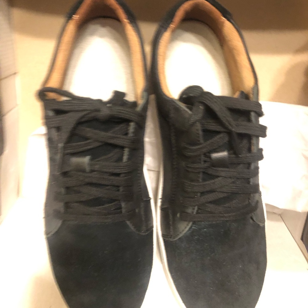 Rockport woman’s Black and Tan Sneakers